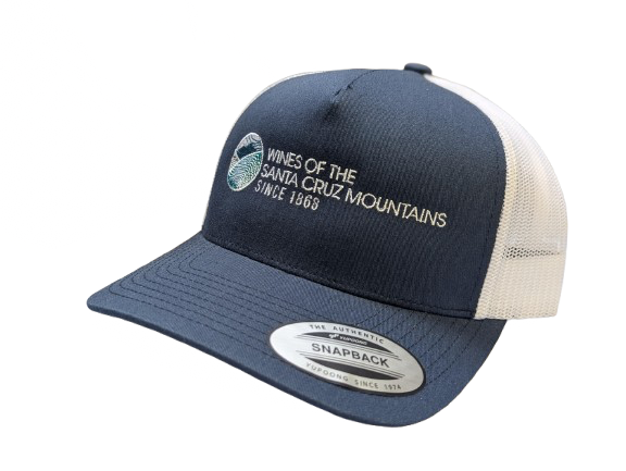 blue and white hat with the wines of the SCM logo embroidered on the front